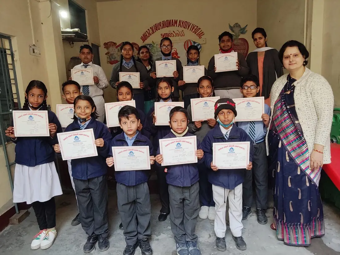 Competition winners with their certificates
