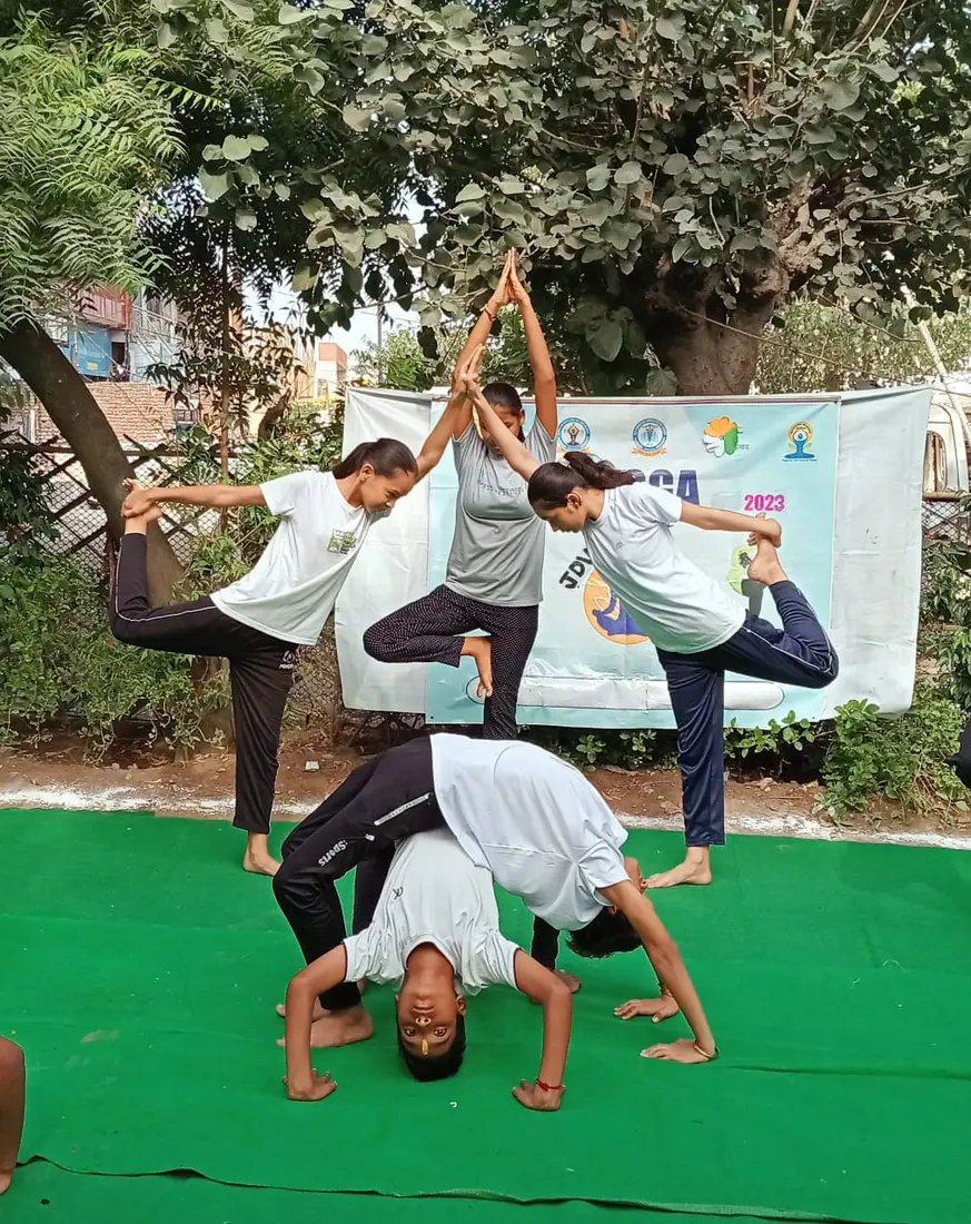 Students doing yoga together